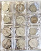 Large collectors folder containing coins from UK various denominations, Ireland, Germany, Jersey,