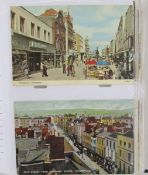 Two postcard albums containing topographical Cheltenham, mixed Gloucester, Cotswolds, total 336
