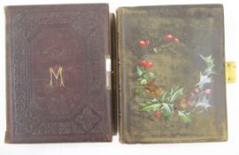 Victorian cartes de visite album painted with birds on holly branch and another with printed