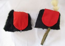 Two Royal Artillery busbys.