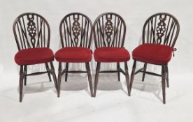 Set of four reproduction dark stained beech-framed wheelback windsor chairs (4)