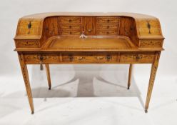 Sheraton Revival satinwood Carlton House desk having multiple drawers and storage compartments, with