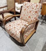 20th century bentwood armchair, upholstered with tan floral sprays on a cream ground