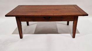 20th century cherrywood coffee table of rectangular form, having a single drawer to the front,