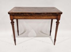 Early 19th century rosewood folding card table, opening to reveal a green baize top, raised on