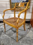 Georgian revival painted satinwood open armchair with trellis work back and cane seat