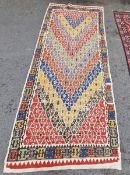 Central Anatolian rug/runner, woven with blue, yellow, manganese and green lozenge-shaped pattern