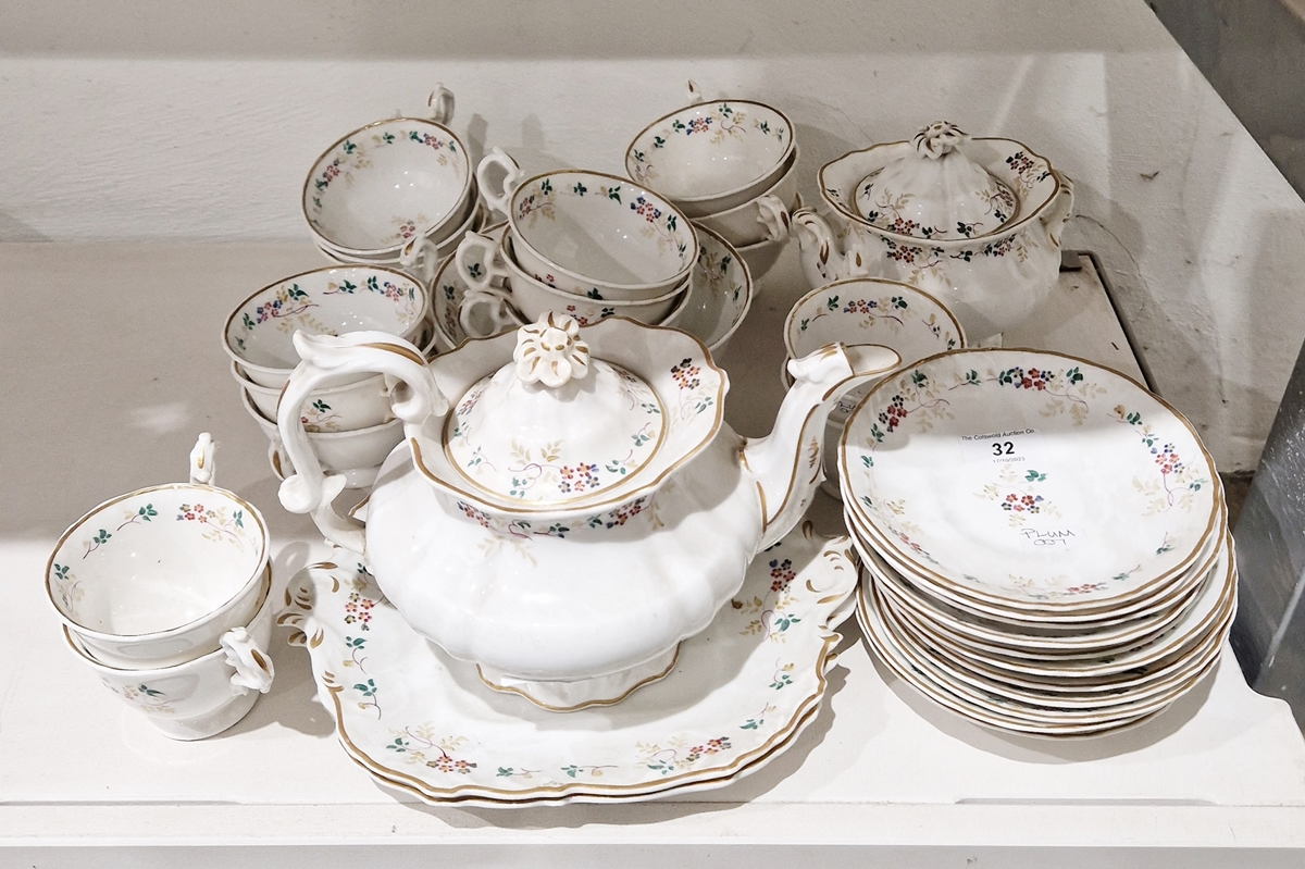 English porcelain part tea service, circa 1835, painted with sprigs of flowers and leafy tendrils