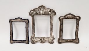 Art Nouveau silver-mounted part photograph frame, another with foliate and scroll design dated 1904,