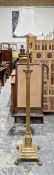 Victorian brass Corinthian column standard lamp, the adjustable column above fluted lower part and