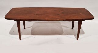 1960s stained teak coffee table, of shaped rectangular form, on four tapering square section legs,