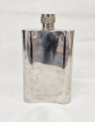 Oversized polished metal hip flask of plain form, the front blank, the reverse engraved 'The Wassail