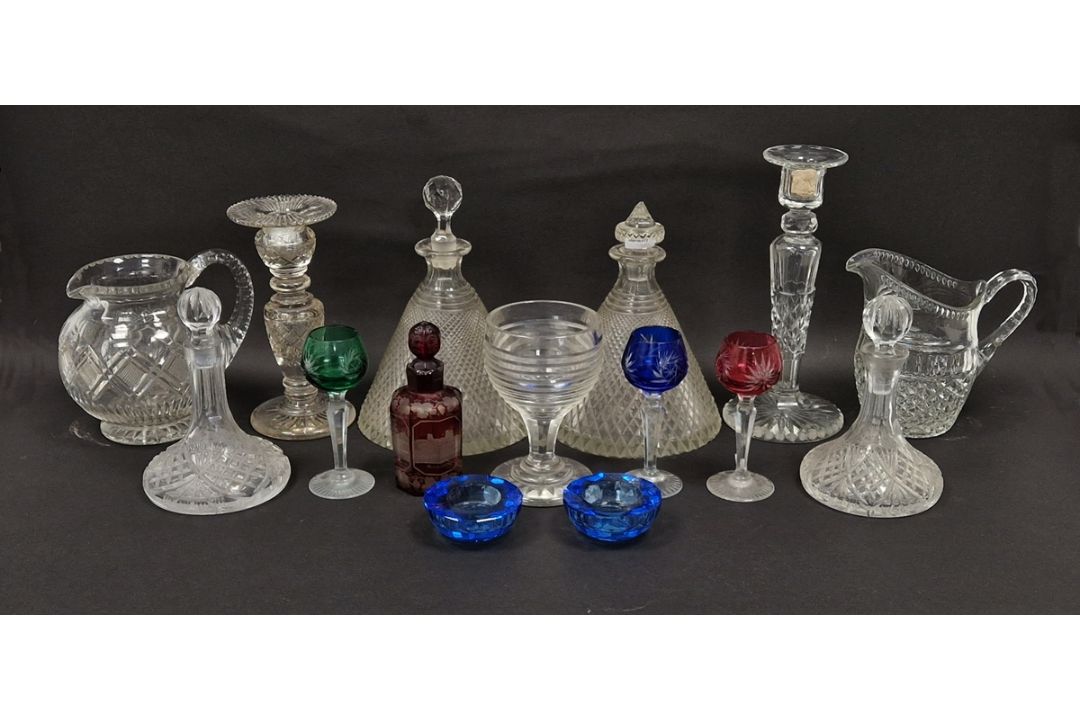 Assorted 19th and 20th century cut glass including a pair of diamond-cut conical decanters with
