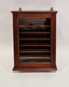 20th century mahogany wall-hanging display cabinet, the single glazed door opening to reveal six