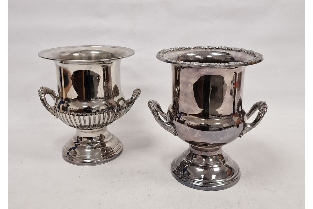 Two 20th century silver-plated urn-shaped champagne coolers, one with label for 'Ranleigh', each