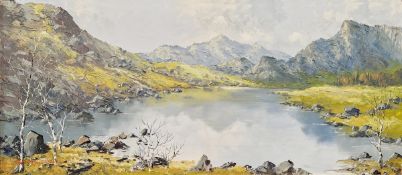 Charles Wyatt Warren (1908-1993) Oil on board Highland lake scene, signed, 24cm x 54cm