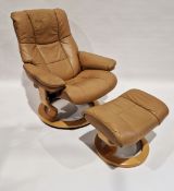 Stressless Ekornes reclining armchair and footstool, upholstered in beige leather, on circular