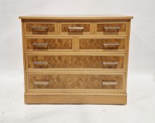 Contemporary burrwood veneer and oak veneer chest of drawers, comprising five short and two long