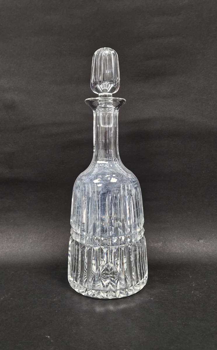 Cut glass mallet-shaped decanter and stopper cut with two bands of prisms, centred by a diamond-