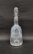 Cut glass mallet-shaped decanter and stopper cut with two bands of prisms, centred by a diamond-
