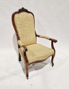 Late 19th/early 20th century mahogany armchair with carved floral finial, with upholstered seat