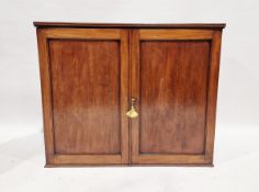 Victorian mahogany bookcase, with panelled double doors enclosing two adjustable shelves, H101cm x