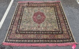 Middle Eastern pink and green ground rug, the central pink and green foliate medallion reserved