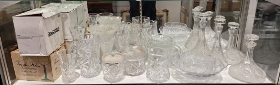 Large collection of cut glass tableware, 20th century, including star-cut decanters in sizes,