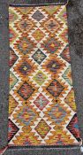 Chobi kilim runner, woven with geometric borders in yellow, blue, red and black, on a cream