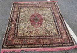 Middle Eastern pink and green ground rug, the central pink and green foliate medallion reserved