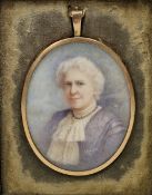 Edwardian portrait miniature, watercolour on ivory, of an elderly woman wearing lace ruff and purple