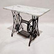 Cast iron Singer sewing machine treadle base, adapted into a side table, with a marble top, 75cm