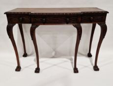 Victorian mahogany console table, having a central long drawer flanked by a single drawer on each