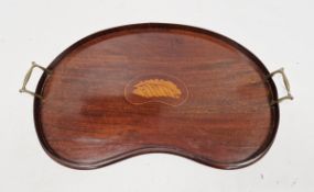 Mahogany kidney-shaped galleried tray with central shell inlay and brass carry handles, 59cm x 38cm