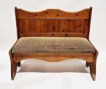 Pair of 20th century pine settles with upholstered seat base, 103cm high x 124cm wide x 54cm deep (