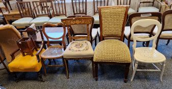 Late 19th/early 20th century mahogany low armchair, with inlaid marquetry and stringing throughout