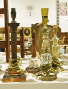 Stainess steel table lamp, a brass table lamp formed as a Corinthian column, a turned wood table