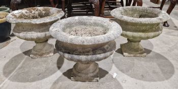 Three garden urns of reconstituted stone, in the classical-style, 45cm x 37cm (3)