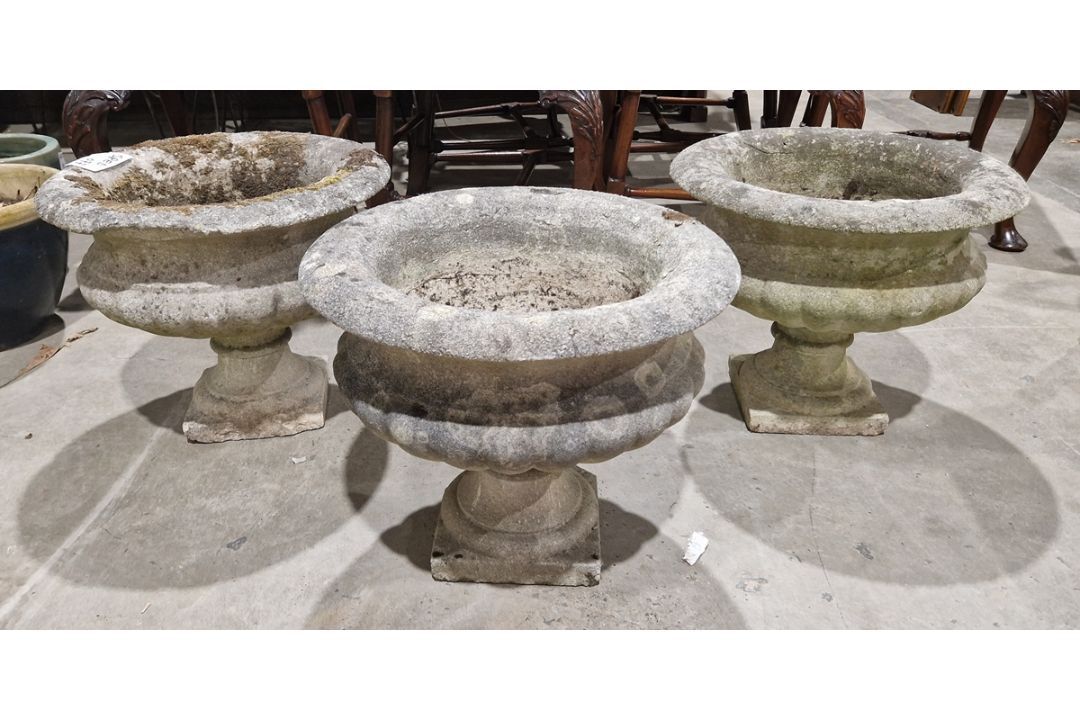 Three garden urns of reconstituted stone, in the classical-style, 45cm x 37cm (3)