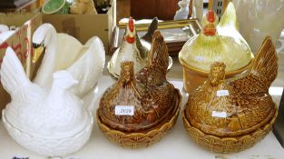 Collection of ceramic egg baskets modelled as hens sitting on baskets and a ceramic swan vase