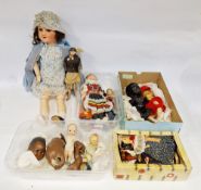 Mid-20th century doll with jointed composition body and sleeping blue eyes, small bisque headed