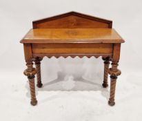 Late 19th/early 20th century oak Gothic style hall table with single drawer to one side, raised on