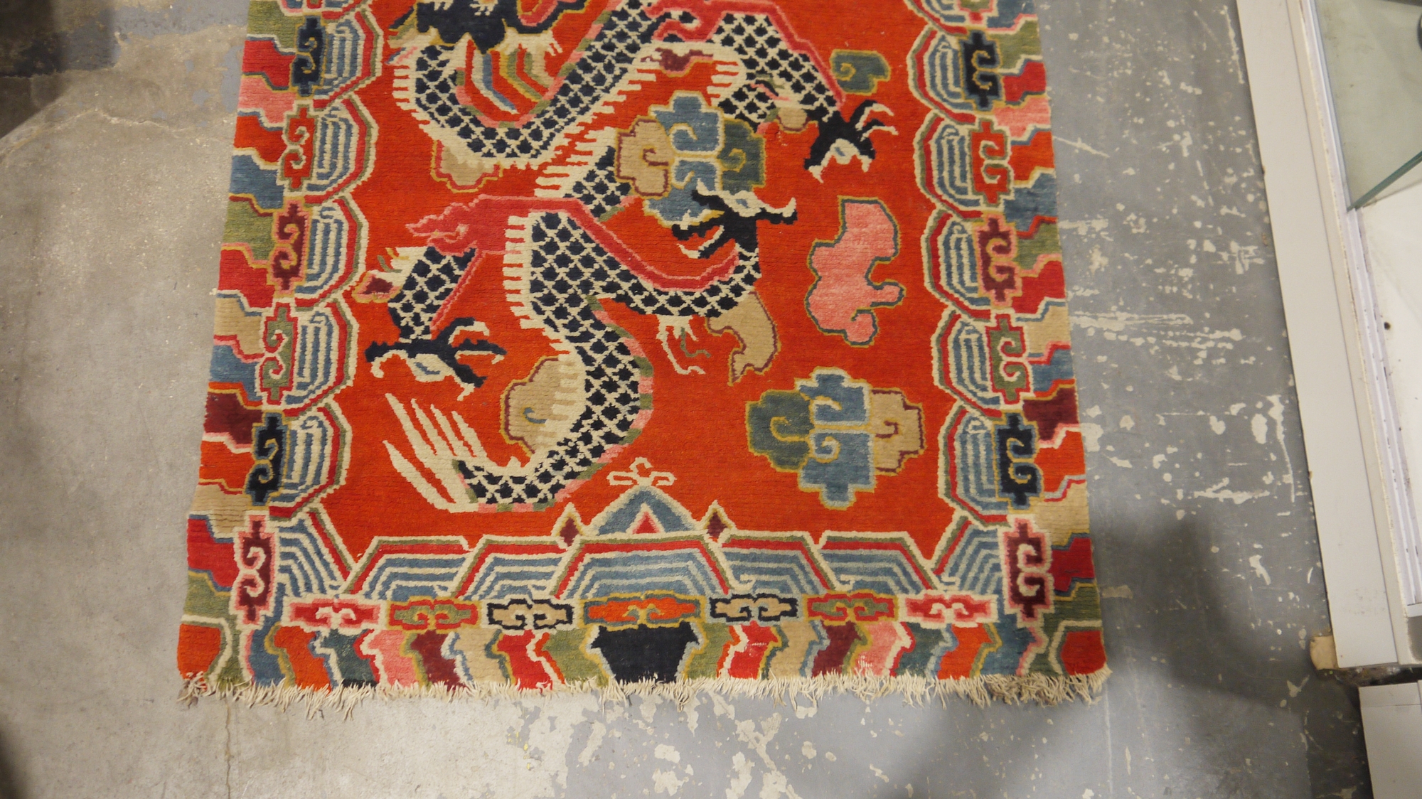 Pair of Chinese style rugs, possibly Tibetan, the central panel with two dragons chasing flaming - Image 54 of 88