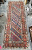 Caucasian-style runner with diagonal stripes of botehs to the central field and having geometric