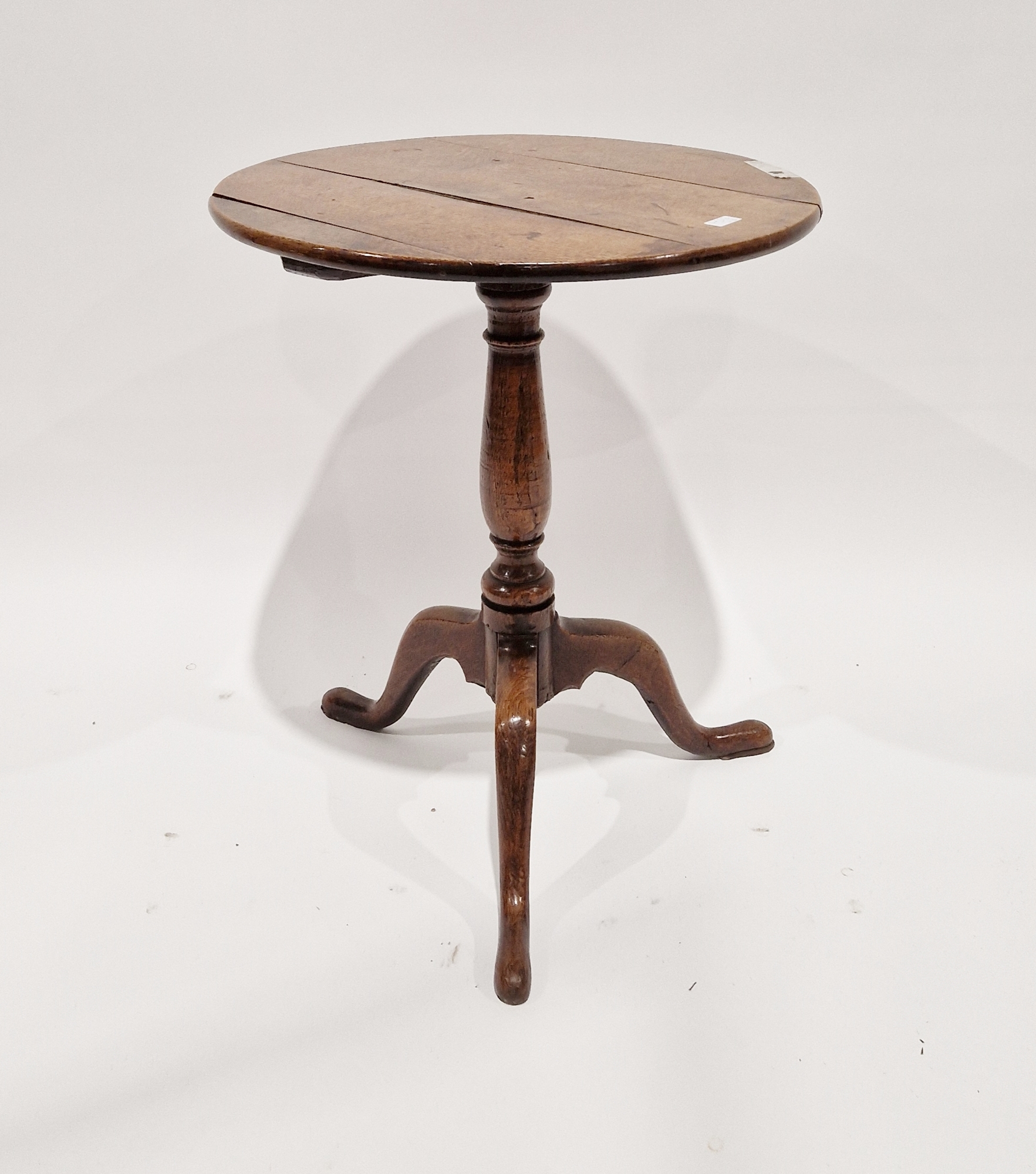 Antique oak circular tripod table