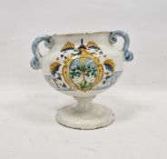 Italian maiolica armorial two-handled footed vase-shaped albarello, probably 17th century, with blue