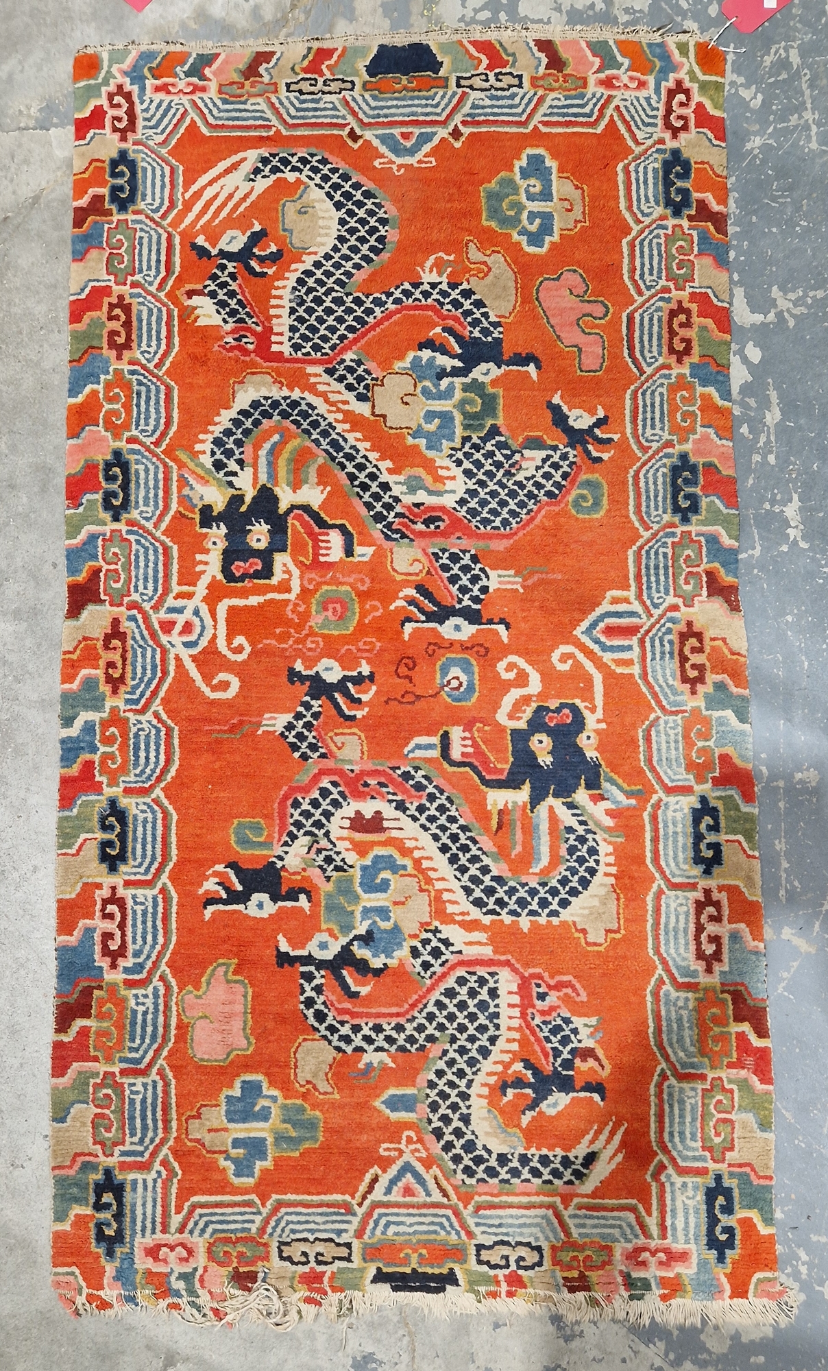 Pair of Chinese style rugs, possibly Tibetan, the central panel with two dragons chasing flaming - Image 45 of 88