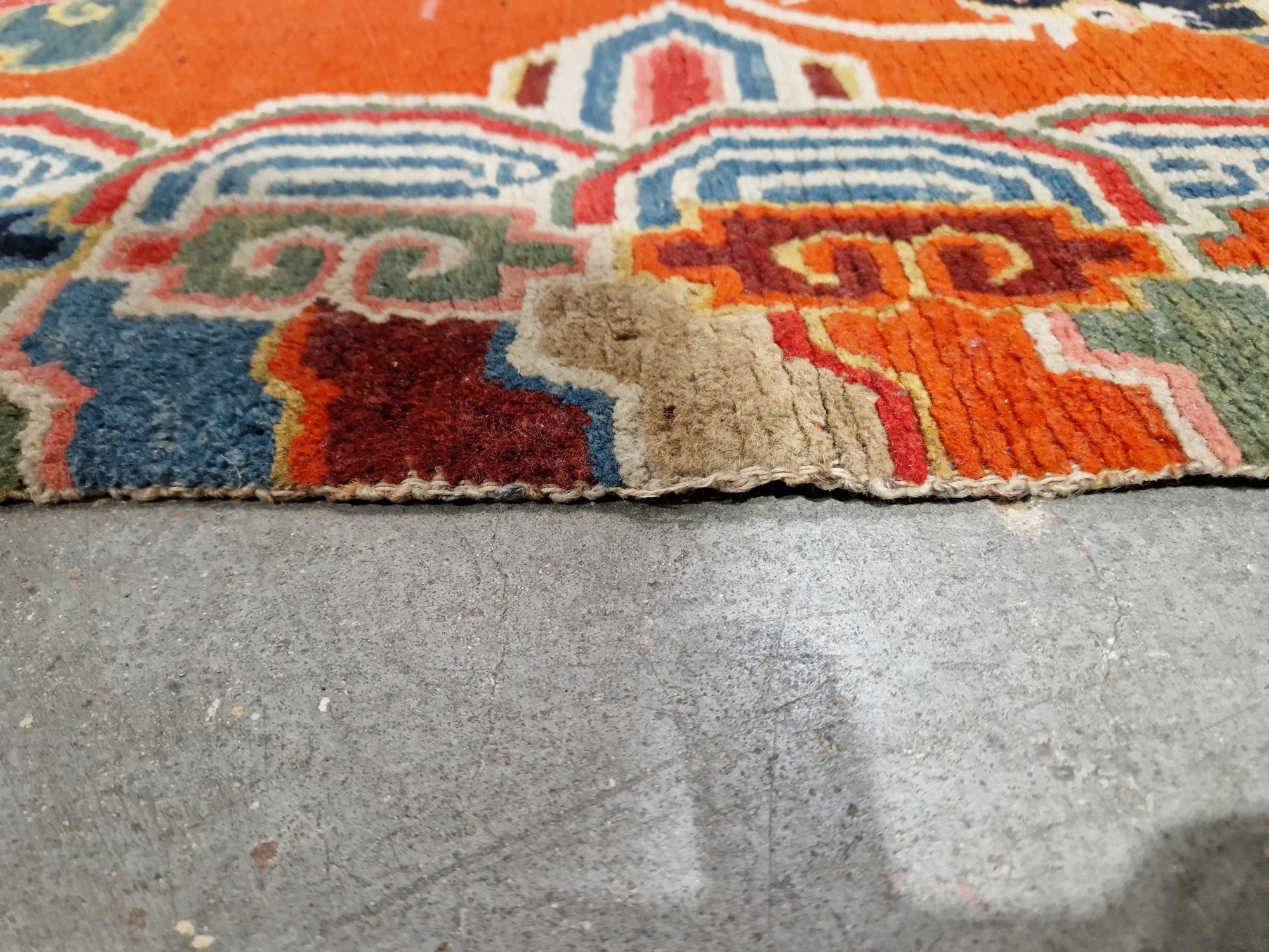 Pair of Chinese style rugs, possibly Tibetan, the central panel with two dragons chasing flaming - Image 41 of 88