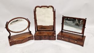 Georgian figured walnut dressing table swing mirror with mercury glass mirror, the stand having