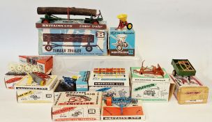 Boxed Britains farming implements to include 9538 vari-spreader, 9560 timber trailer, 9537 acrobat